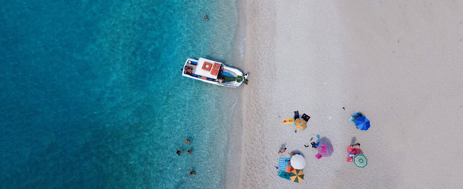 Aerial top view photo of popular tropical paradise deep turquoise rocky seascape in Greece